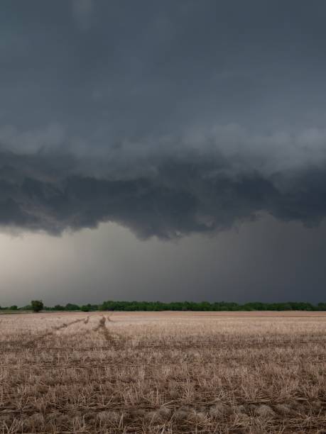 istock Heavy Storm Clouds Over a Dried Stubble Field in Oklahoma 1435154966