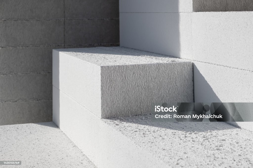 Aerated lightweight gypsum building concrete blocks prepared for building wall modular building house. New Architecture concept Concrete Stock Photo