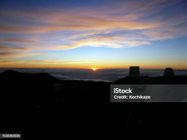 Two Astronomical Telescopes At The Summit Of Maunakea In The Twilight Stock Photo - Download Image Now