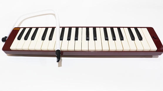Electronic or acoustic piano keys, no people.