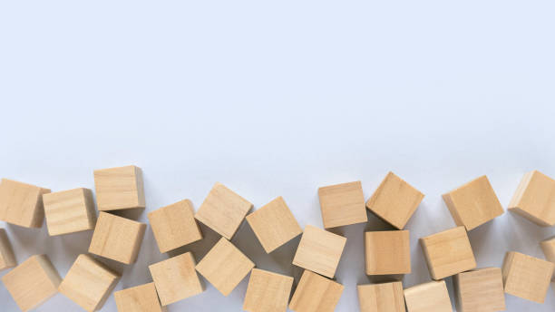 istock Top view of wooden cube on a white background with copy space. 1435191726