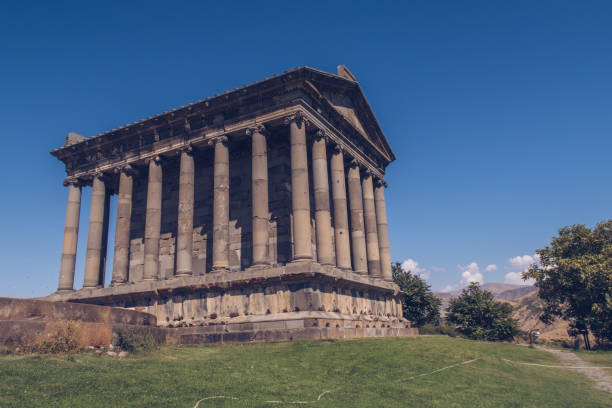 Temple of Garni in Armenia picturesque photo with the blue sky in the background and no people around. Ruins of ancient Armenian temple. Armenia landscape attraction. stock photo