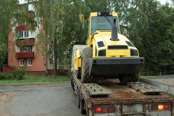 construction vehicle on flatbed truck