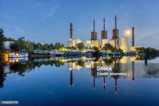 A Combined Heat And Power Plant In Berlin At Night Stock Photo - Download Image Now - Thermal Power Station, Cogeneration Plant, Air Pollution