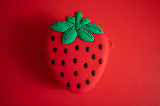 Strawberry on red background