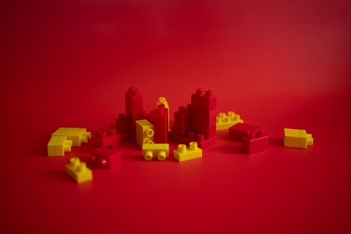 Building blocks on red background