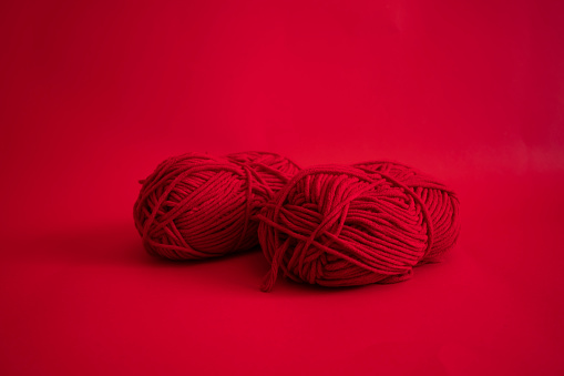 Yarn on red background