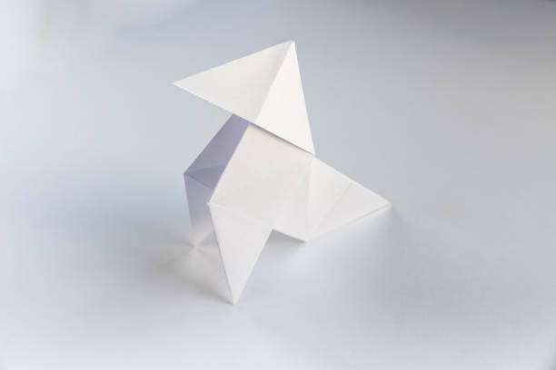 istock Paper hen origami isolated on a white background 1435211082