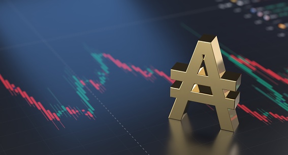 Austral Argentina currency symbol standing over a financial graph, stock market exchange, inflation, economy, recession