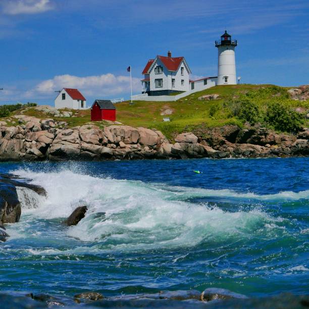 istock View of Nubble lighthouse on the coast under the blue sky 1435217813