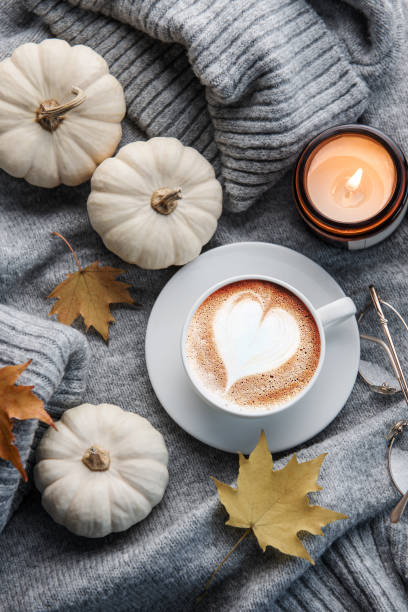 istock White pumpkins, coffee and autumn leaves 1435220702