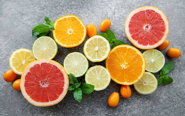 Fresh summer fruits Fresh summer fruits on a concrete background citrus fruit stock pictures, royalty-free photos & images