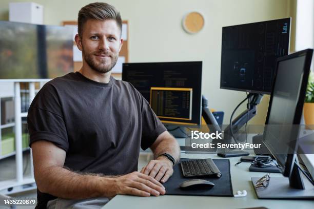 Portrait Of Computer Programmer At Workplace Stock Photo - Download ...