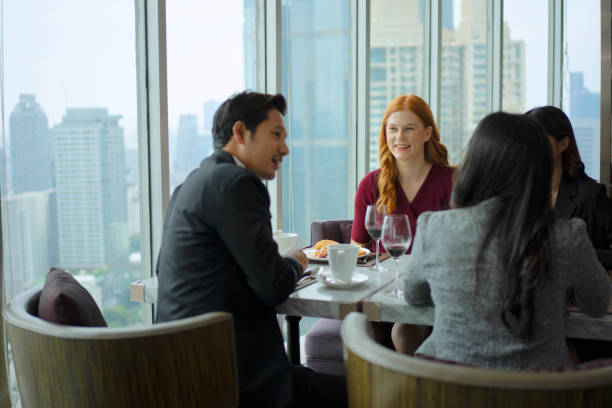 istock Coworker are celebrating while dinning at hotel. 1435228588