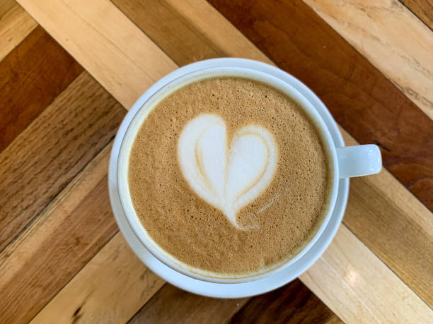istock A cup of coffee latte on a wooden table 1435234157