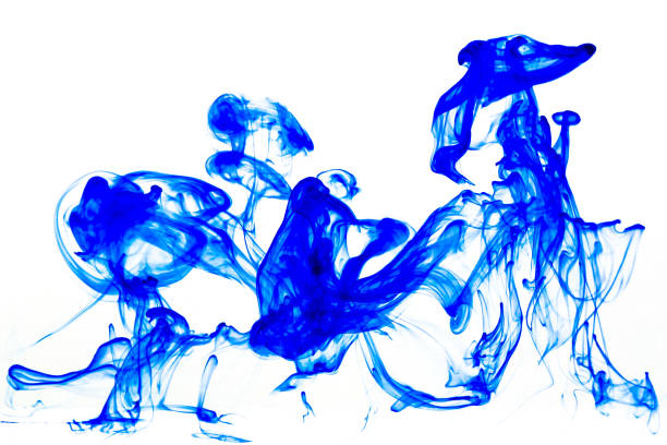 istock Blue paint dissolving in water with white background 1435235225