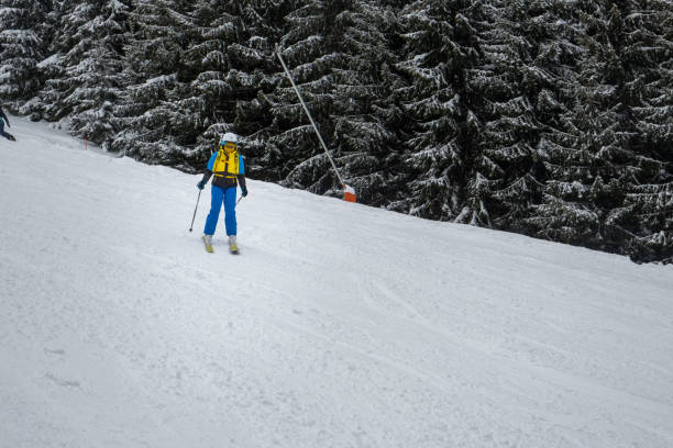 istock woman skier on the slope 1435237946
