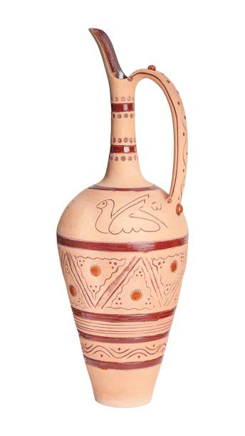 istock Vintage decorated ceramic jug isolated on a white background 1435239299