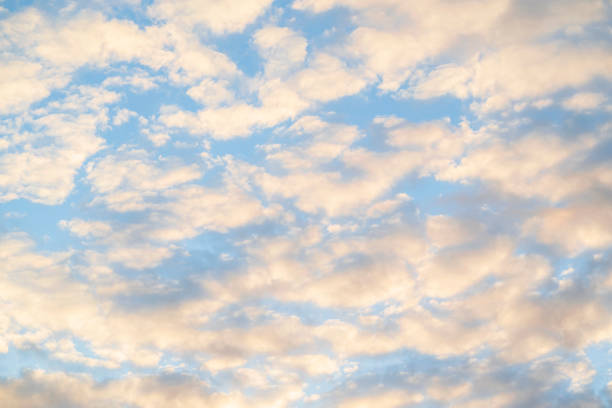 istock Beautiful blue cloudy shining sky in the evening 1435242738