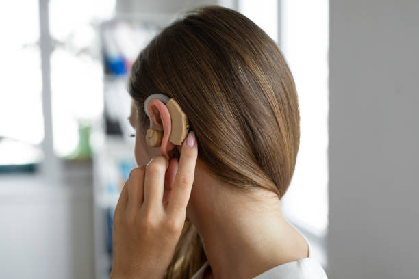 istock Woman wearing a hearing aid 1435242924