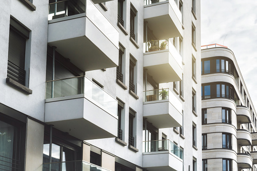 facade with balconies of modern apartment buildings in central Berlin