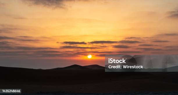 Scenic View Of Sunset Over Liwa Desert In The United Arab Emirates Stock Photo - Download Image Now