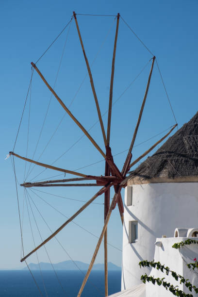 istock Windmill at Oia overlooking sea 1435248856