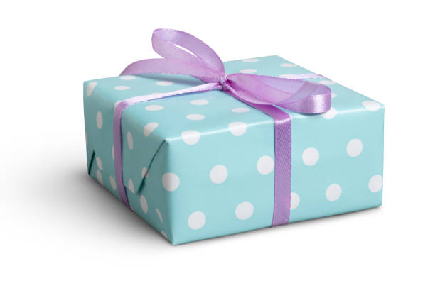 Violet gift box with yellow ribbon on white. This file is cleaned, retouched and contains clipping path.