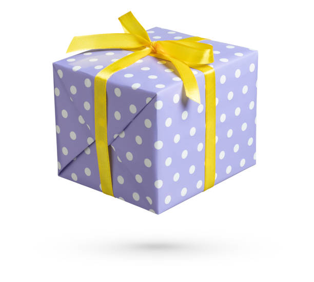 Violet gift box with yellow ribbon on white. This file is cleaned, retouched and contains clipping path.