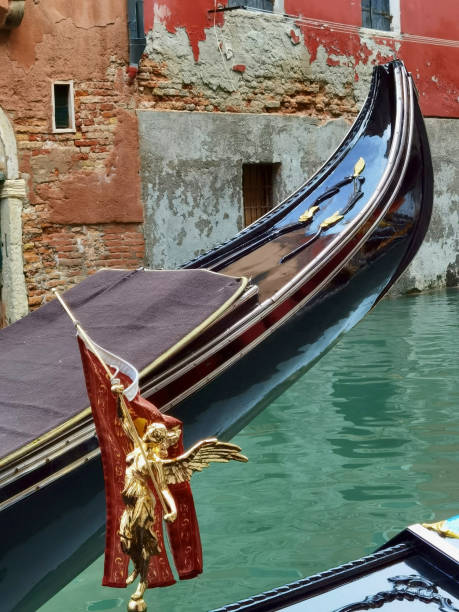 gondola on a canal in Venice in Italy stock photo