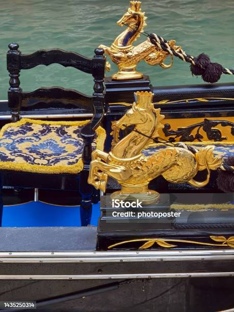 Gondola On A Canal In Venice In Italy Stock Photo - Download Image Now - Boot, Color Image, Gold Colored