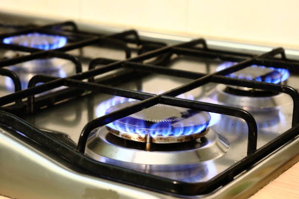istock Hob with lit burners in the kitchen. 1435256164