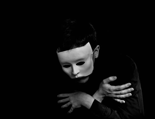 istock Young man portrait wearing white mask and posing 1435257731