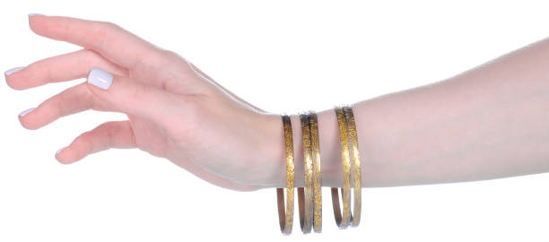 istock female stack bangles bracelet on female hand 1435263915