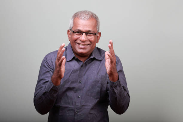 istock Smiling senior man of Indian ethnicity with a communicative gesture 1435264029