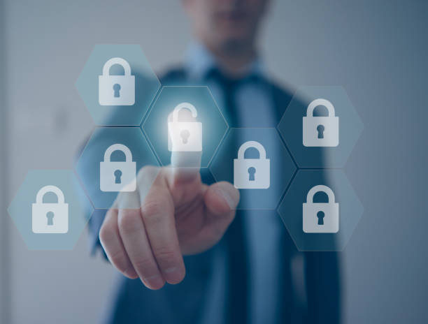 istock Businessman touching user interface and using finger print biometrics to unlock and access network 1435266630