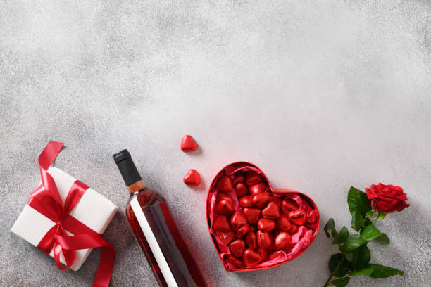 istock Valentine's day card with romantic gift, red roses. 1435272982