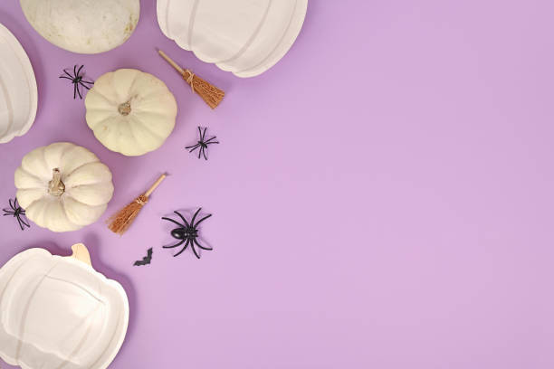 istock Halloween party flat lay  on violet background with copy space 1435276603