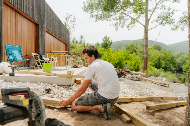 istock Portrait of a carpenter working on a renovation project in his yard 1435279761