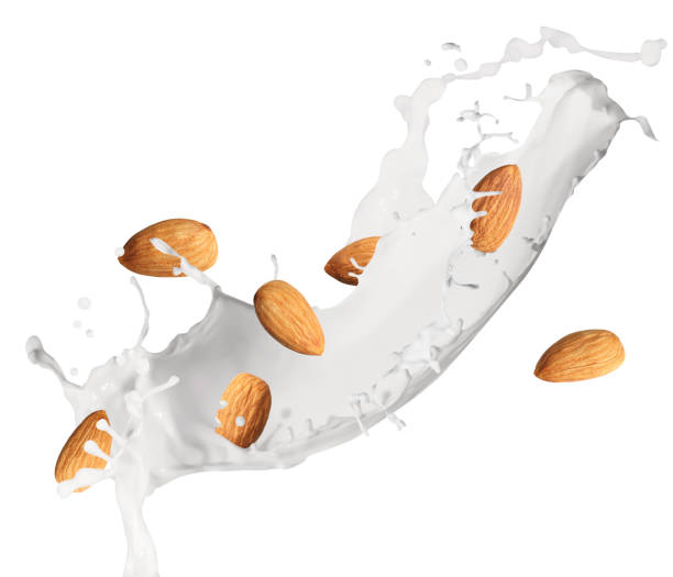 istock Delicious almond milk and nuts on white background 1435284481