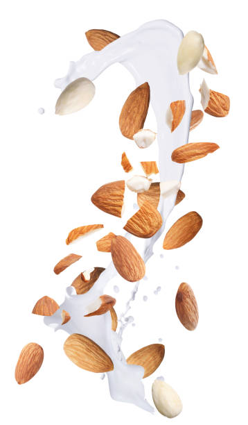 istock Delicious almond milk and nuts on white background 1435284516