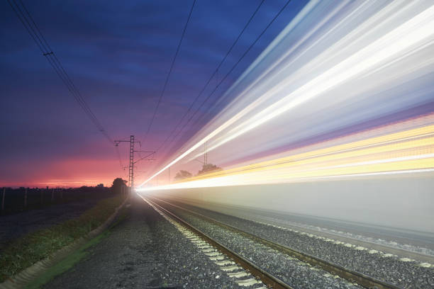 istock Light trail of high speed train on railroad track 1435284787