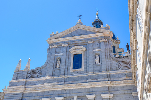 Low-angle view of a church facade in Madrid, Spain