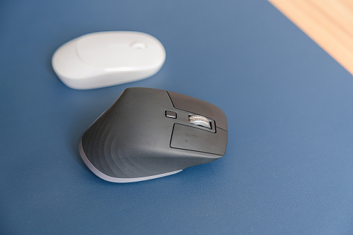 Comparison of Ergonomic vertical mouse and general mouse on desk at workplace, prevention wrist pain. De Quervain s tenosynovitis, Intersection Symptom, Carpal Tunnel or Office syndrome concept