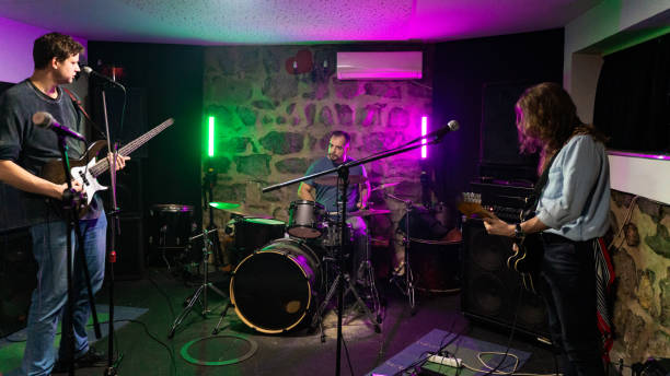 istock Music band having a rehearsal in studio 1435289317