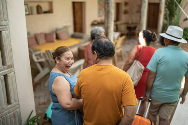istock Mature couple talking while arriving to their accommodation 1435291533