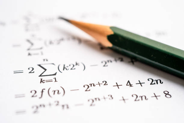 istock Pencil on mathematic formula exercise test paper in education school. 1435295114