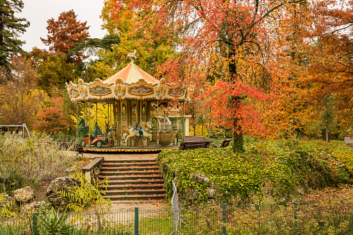 Jardin Public park and old carousel in Autumn in Bordeaux, France
