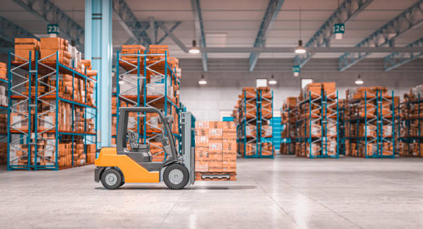 forklift with pallets inside a warehouse. - warehouse imagens e fotografias de stock