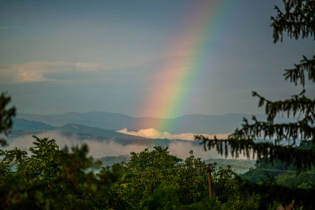 Rainbow over the mountains and clouds, Stara Planina or Old Mountain, Serbia